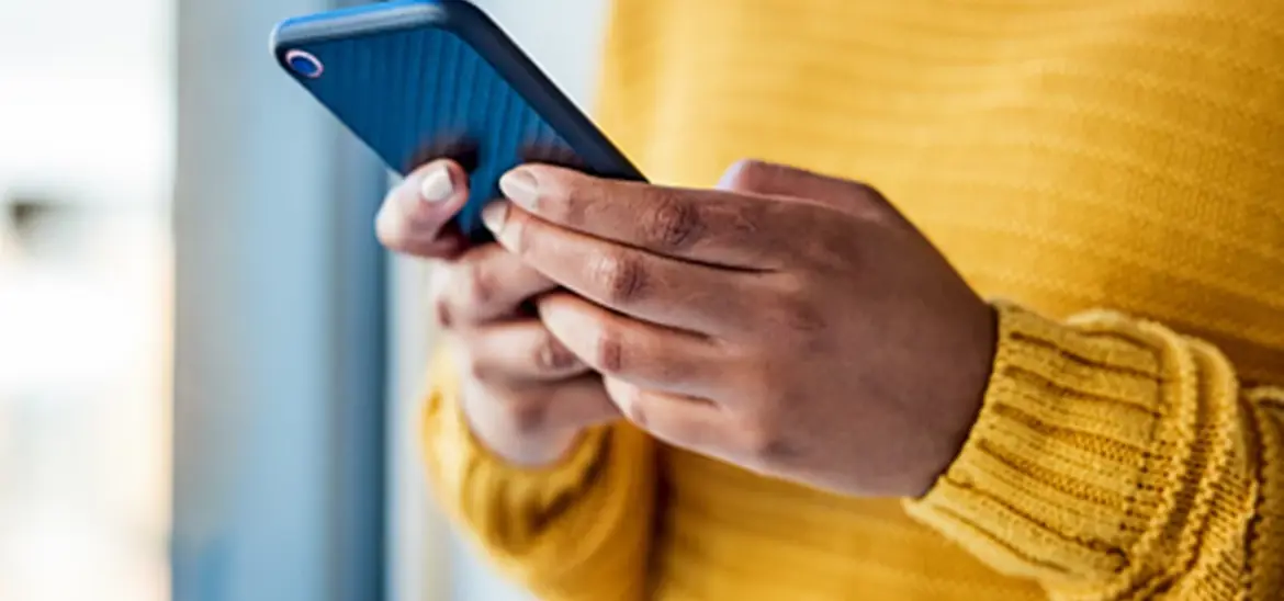 a woman texting on her phone