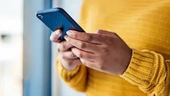 a woman texting on her phone